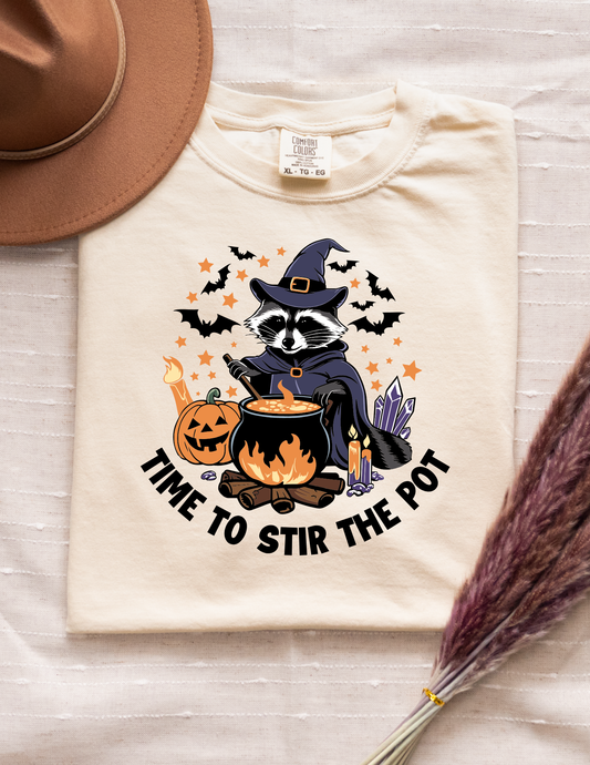 “Time to Stir the Pot” Graphic Tee – Witch Raccoon Halloween Shirt