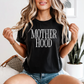 “Motherhood” Tee – For the Moms Who Do It All