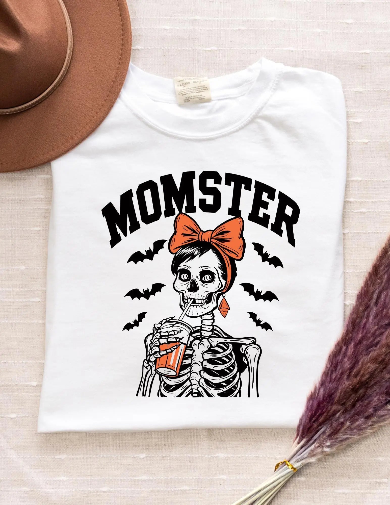 The “Momster” Graphic Tee – Funny Halloween Mom Shirt with Skeleton Design Twice the Charm Boutique